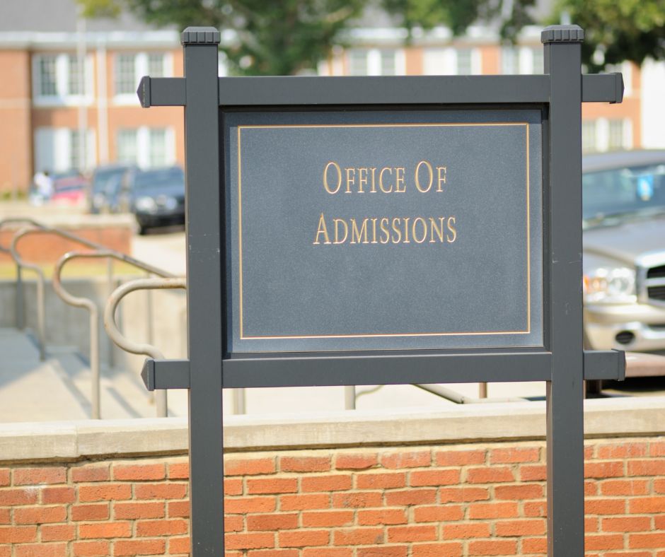 CCC Students receive priority admission. Depicted is black sign with office of admissions placed on it