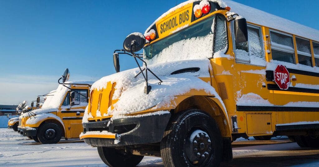 school bus, covered in snow, represents winter at college, winter session courses, intercession courses california community college